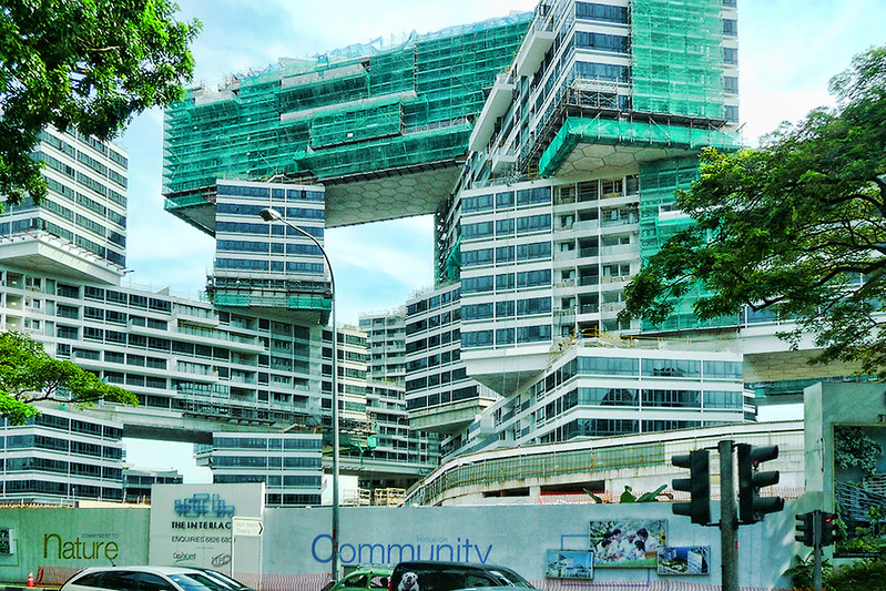 A residential complex under construction that is composed of rectangular sections stacked in an apparently ad hoc way